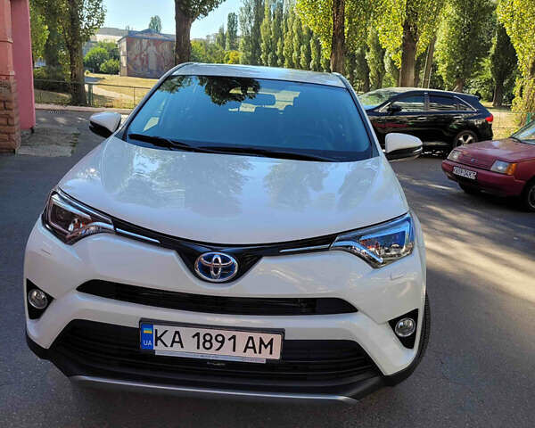 Белый Тойота РАВ 4, объемом двигателя 2.49 л и пробегом 91 тыс. км за 23900 $, фото 1 на Automoto.ua
