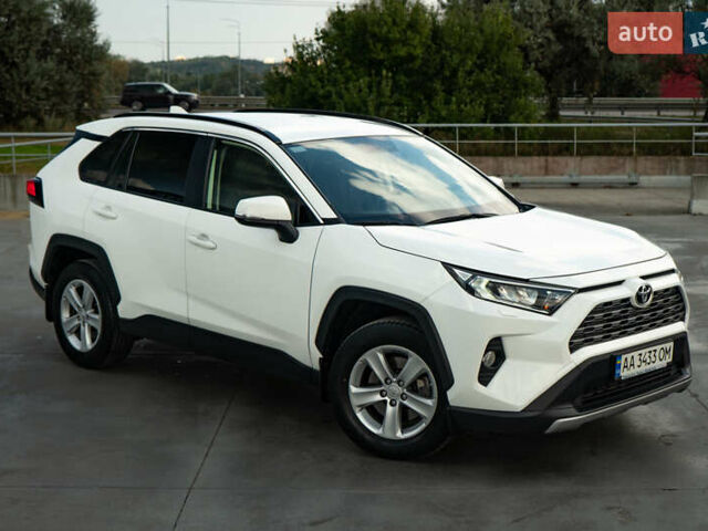 Білий Тойота РАВ 4, об'ємом двигуна 2 л та пробігом 105 тис. км за 25900 $, фото 1 на Automoto.ua