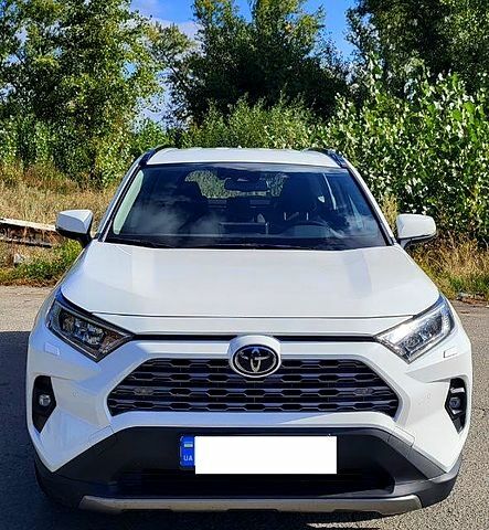 Белый Тойота РАВ 4, объемом двигателя 2 л и пробегом 149 тыс. км за 26500 $, фото 1 на Automoto.ua