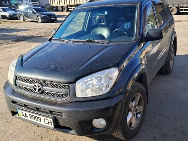 Черный Тойота РАВ 4, объемом двигателя 2 л и пробегом 319 тыс. км за 5700 $, фото 1 на Automoto.ua