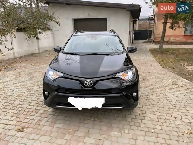 Черный Тойота РАВ 4, объемом двигателя 2.5 л и пробегом 136 тыс. км за 18300 $, фото 1 на Automoto.ua