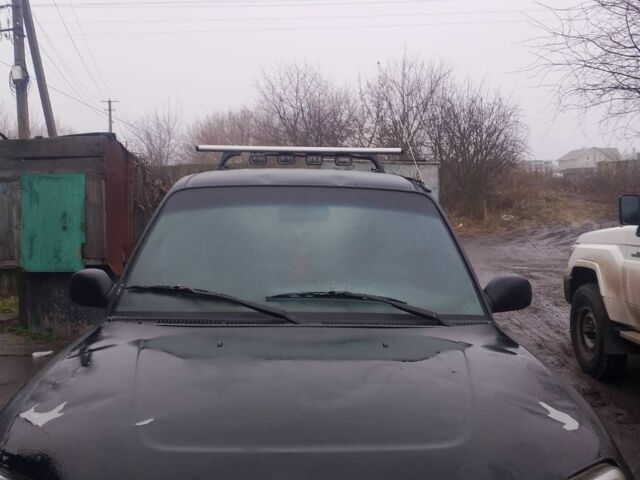 Чорний Тойота РАВ 4, об'ємом двигуна 2 л та пробігом 2 тис. км за 2600 $, фото 1 на Automoto.ua