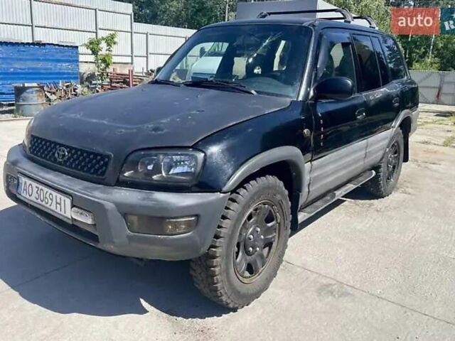 Чорний Тойота РАВ 4, об'ємом двигуна 2 л та пробігом 260 тис. км за 3010 $, фото 1 на Automoto.ua