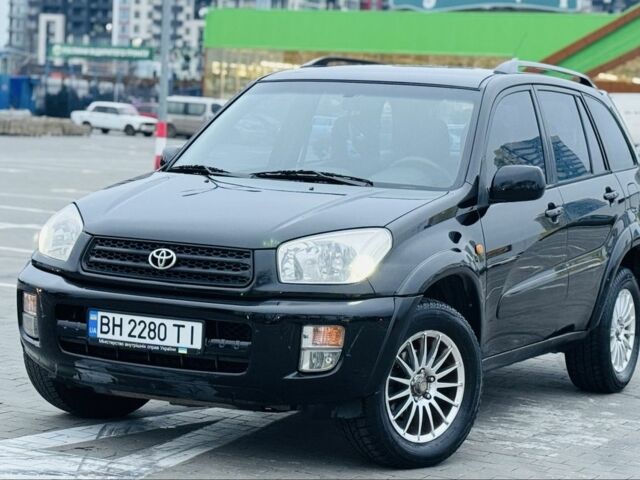 Черный Тойота РАВ 4, объемом двигателя 2 л и пробегом 205 тыс. км за 5900 $, фото 1 на Automoto.ua