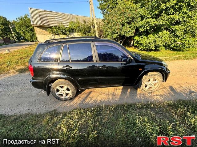 Чорний Тойота РАВ 4, об'ємом двигуна 2 л та пробігом 493 тис. км за 4999 $, фото 1 на Automoto.ua