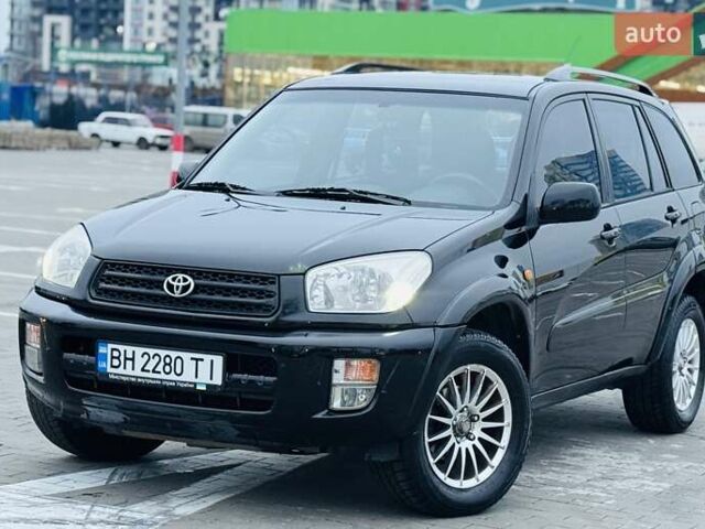 Черный Тойота РАВ 4, объемом двигателя 2 л и пробегом 205 тыс. км за 5900 $, фото 1 на Automoto.ua