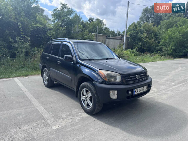 Чорний Тойота РАВ 4, об'ємом двигуна 2 л та пробігом 243 тис. км за 4200 $, фото 1 на Automoto.ua