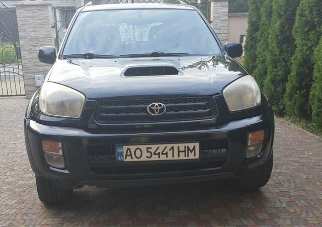 Чорний Тойота РАВ 4, об'ємом двигуна 2 л та пробігом 270 тис. км за 5800 $, фото 1 на Automoto.ua