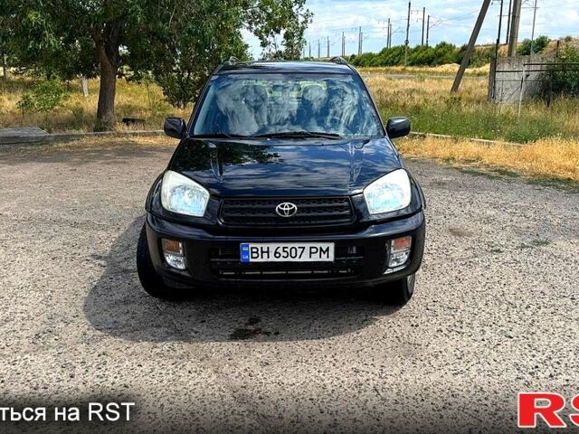 Черный Тойота РАВ 4, объемом двигателя 2 л и пробегом 250 тыс. км за 4650 $, фото 1 на Automoto.ua