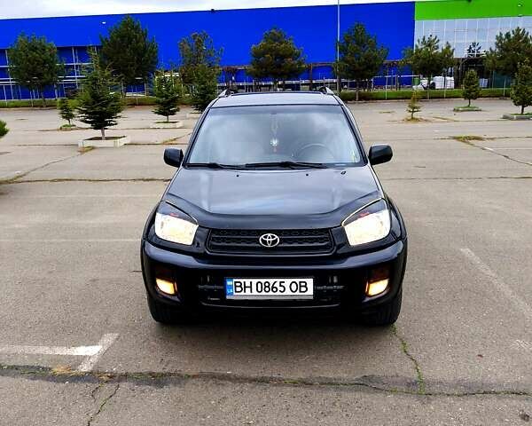 Чорний Тойота РАВ 4, об'ємом двигуна 2 л та пробігом 270 тис. км за 6500 $, фото 1 на Automoto.ua