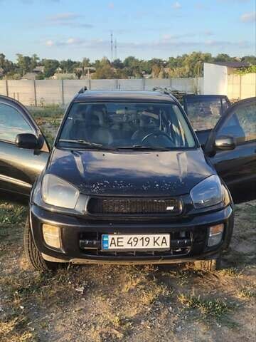 Черный Тойота РАВ 4, объемом двигателя 2 л и пробегом 268 тыс. км за 6500 $, фото 1 на Automoto.ua