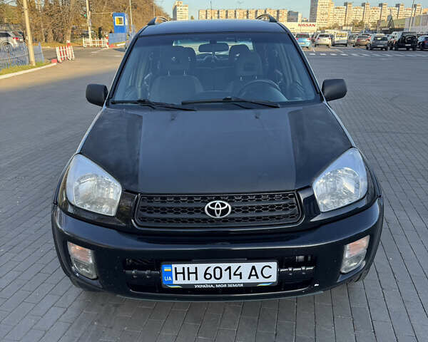 Черный Тойота РАВ 4, объемом двигателя 2 л и пробегом 479 тыс. км за 6000 $, фото 1 на Automoto.ua