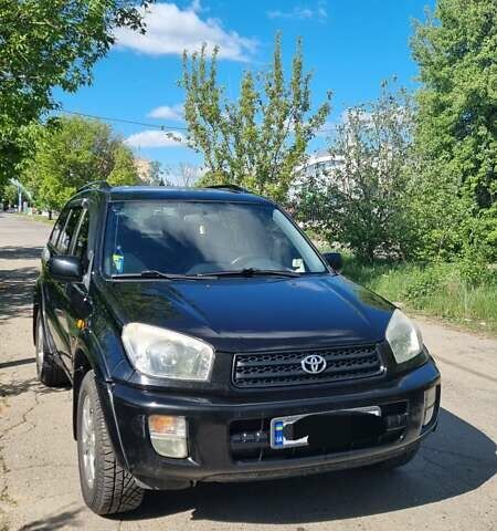 Черный Тойота РАВ 4, объемом двигателя 2 л и пробегом 315 тыс. км за 5900 $, фото 1 на Automoto.ua
