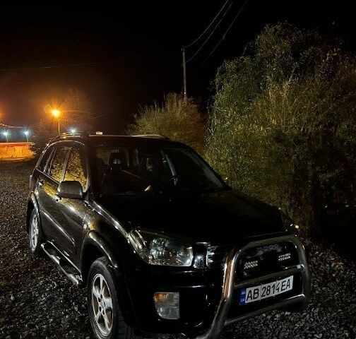 Черный Тойота РАВ 4, объемом двигателя 2 л и пробегом 285 тыс. км за 6000 $, фото 1 на Automoto.ua