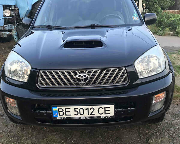 Чорний Тойота РАВ 4, об'ємом двигуна 2 л та пробігом 243 тис. км за 7500 $, фото 1 на Automoto.ua
