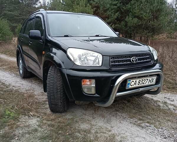 Чорний Тойота РАВ 4, об'ємом двигуна 2 л та пробігом 358 тис. км за 6800 $, фото 1 на Automoto.ua