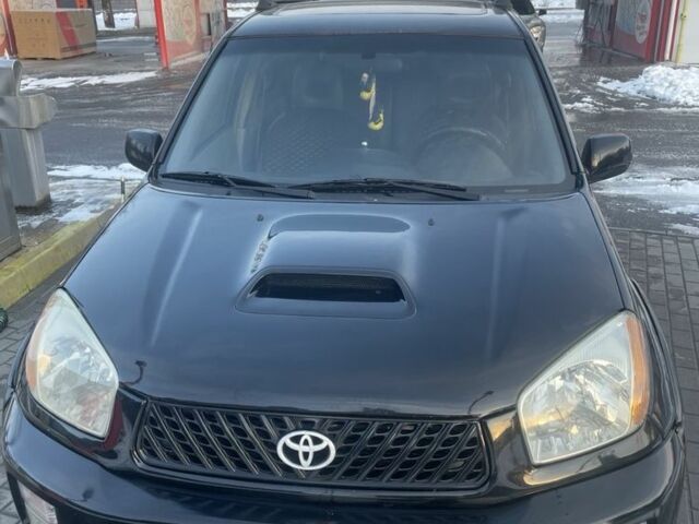 Черный Тойота РАВ 4, объемом двигателя 2 л и пробегом 217 тыс. км за 5400 $, фото 1 на Automoto.ua