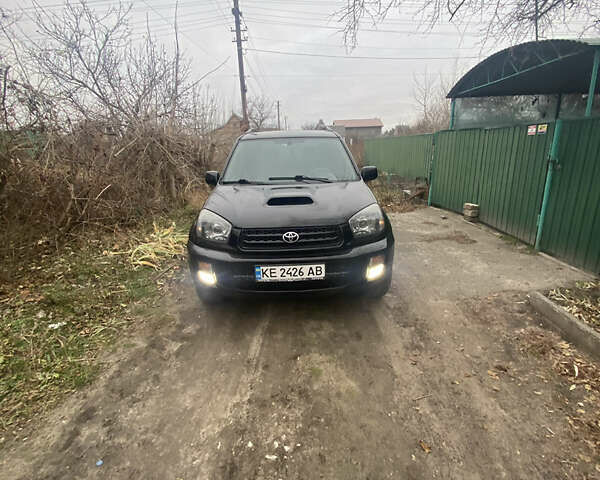 Черный Тойота РАВ 4, объемом двигателя 2 л и пробегом 340 тыс. км за 8000 $, фото 1 на Automoto.ua