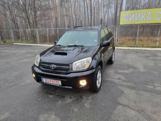 Черный Тойота РАВ 4, объемом двигателя 2 л и пробегом 275 тыс. км за 4800 $, фото 1 на Automoto.ua