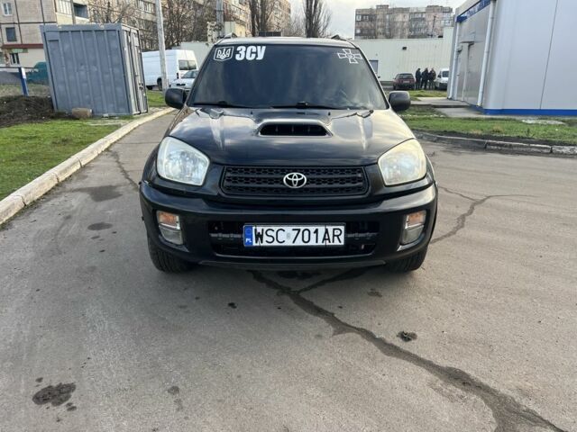 Чорний Тойота РАВ 4, об'ємом двигуна 2 л та пробігом 320 тис. км за 3200 $, фото 1 на Automoto.ua