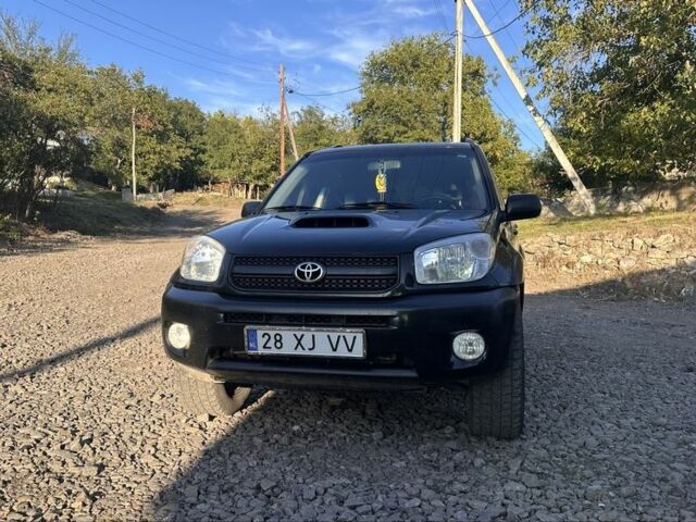 Чорний Тойота РАВ 4, об'ємом двигуна 2 л та пробігом 347 тис. км за 4800 $, фото 1 на Automoto.ua