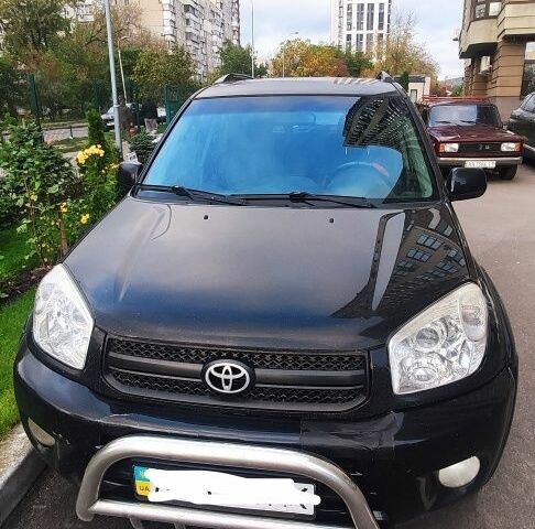 Чорний Тойота РАВ 4, об'ємом двигуна 2 л та пробігом 504 тис. км за 5700 $, фото 1 на Automoto.ua