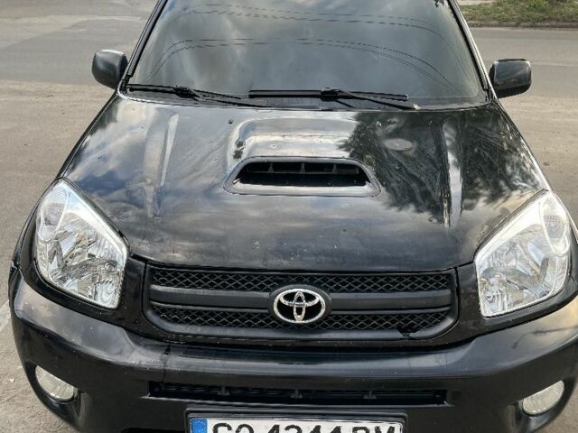 Черный Тойота РАВ 4, объемом двигателя 2 л и пробегом 250 тыс. км за 4800 $, фото 1 на Automoto.ua