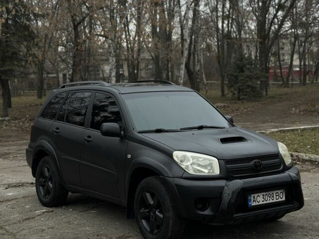 Чорний Тойота РАВ 4, об'ємом двигуна 2 л та пробігом 285 тис. км за 4300 $, фото 1 на Automoto.ua
