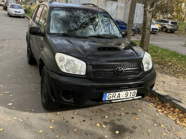Черный Тойота РАВ 4, объемом двигателя 2 л и пробегом 300 тыс. км за 3600 $, фото 1 на Automoto.ua