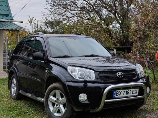 Черный Тойота РАВ 4, объемом двигателя 2 л и пробегом 186 тыс. км за 9500 $, фото 1 на Automoto.ua