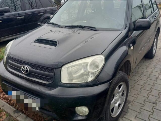 Чорний Тойота РАВ 4, об'ємом двигуна 2 л та пробігом 297 тис. км за 3800 $, фото 1 на Automoto.ua