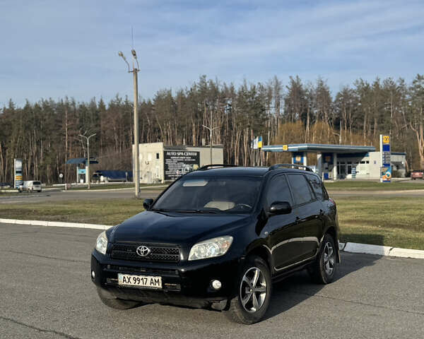 Чорний Тойота РАВ 4, об'ємом двигуна 2.36 л та пробігом 190 тис. км за 8600 $, фото 1 на Automoto.ua
