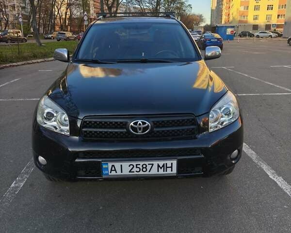 Черный Тойота РАВ 4, объемом двигателя 1.99 л и пробегом 313 тыс. км за 12000 $, фото 1 на Automoto.ua