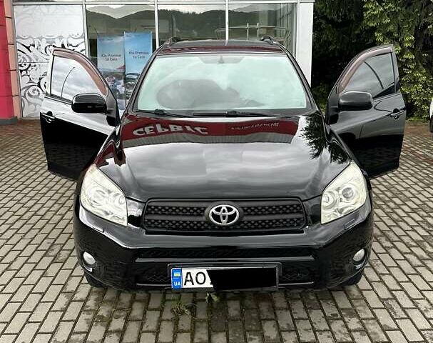 Черный Тойота РАВ 4, объемом двигателя 2 л и пробегом 245 тыс. км за 7999 $, фото 1 на Automoto.ua