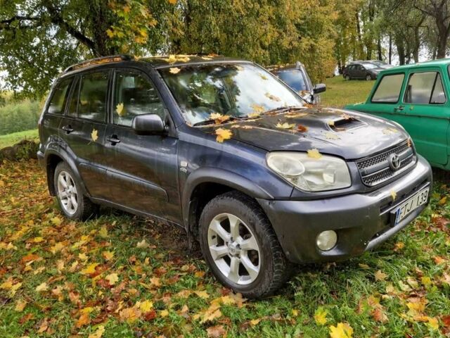 Черный Тойота РАВ 4, объемом двигателя 2 л и пробегом 310 тыс. км за 4500 $, фото 1 на Automoto.ua