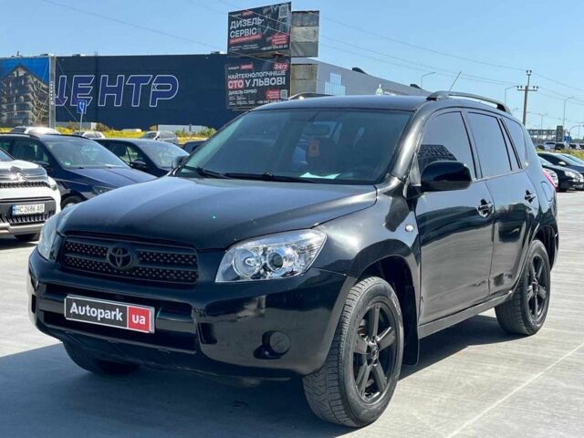 Чорний Тойота РАВ 4, об'ємом двигуна 2 л та пробігом 300 тис. км за 6490 $, фото 1 на Automoto.ua