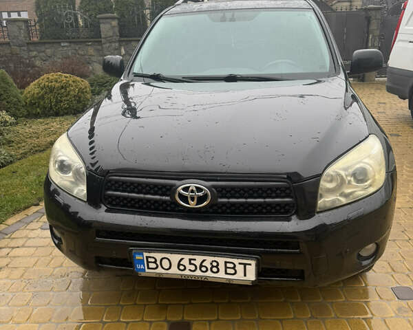 Черный Тойота РАВ 4, объемом двигателя 2 л и пробегом 230 тыс. км за 8500 $, фото 1 на Automoto.ua