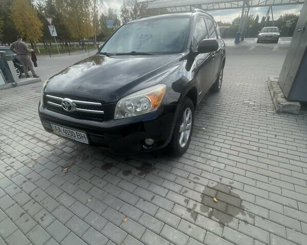 Черный Тойота РАВ 4, объемом двигателя 2.36 л и пробегом 241 тыс. км за 8900 $, фото 1 на Automoto.ua