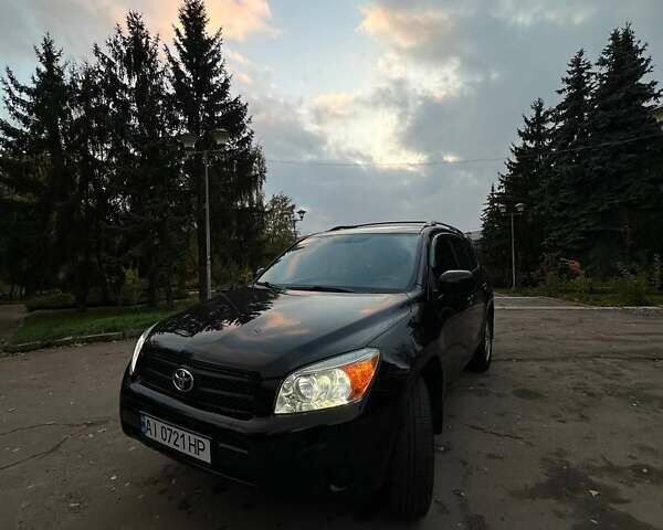 Черный Тойота РАВ 4, объемом двигателя 2.36 л и пробегом 265 тыс. км за 9499 $, фото 1 на Automoto.ua