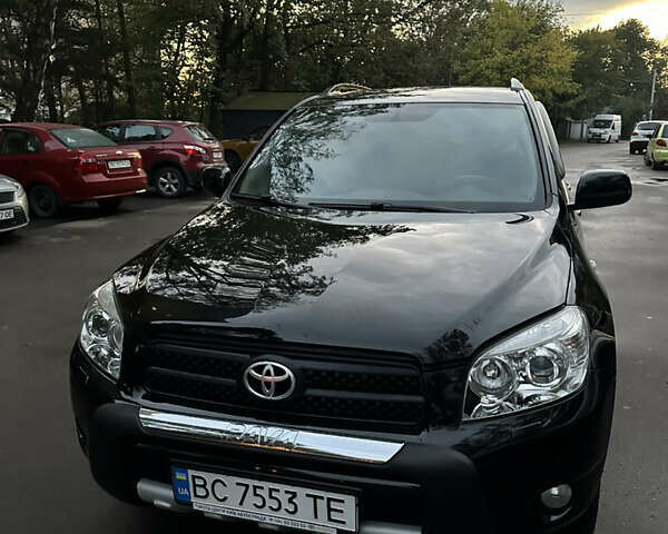 Чорний Тойота РАВ 4, об'ємом двигуна 2 л та пробігом 92 тис. км за 11700 $, фото 1 на Automoto.ua
