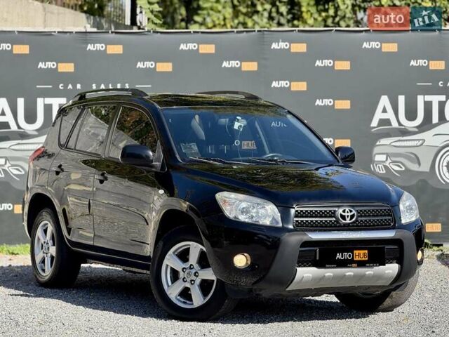 Чорний Тойота РАВ 4, об'ємом двигуна 2 л та пробігом 170 тис. км за 9900 $, фото 1 на Automoto.ua