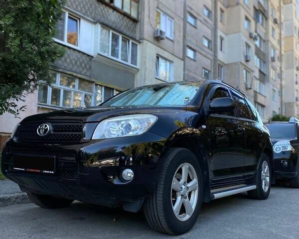 Чорний Тойота РАВ 4, об'ємом двигуна 2 л та пробігом 247 тис. км за 10500 $, фото 1 на Automoto.ua