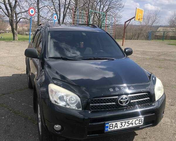 Черный Тойота РАВ 4, объемом двигателя 2.4 л и пробегом 187 тыс. км за 9700 $, фото 1 на Automoto.ua