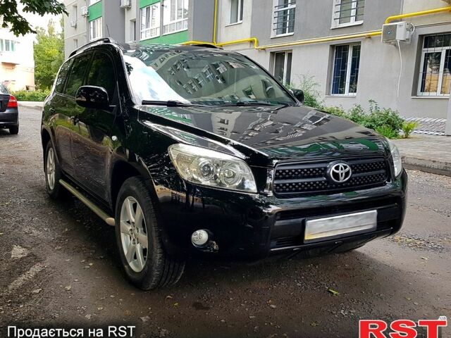 Чорний Тойота РАВ 4, об'ємом двигуна 2.4 л та пробігом 228 тис. км за 9500 $, фото 1 на Automoto.ua