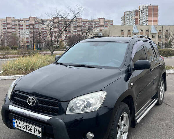 Черный Тойота РАВ 4, объемом двигателя 2 л и пробегом 248 тыс. км за 8700 $, фото 1 на Automoto.ua