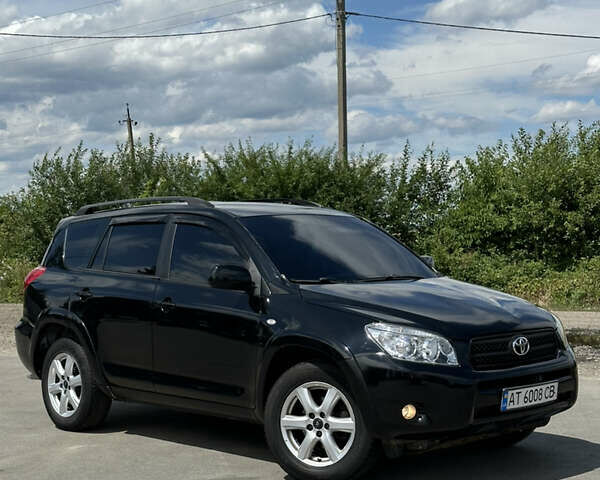 Черный Тойота РАВ 4, объемом двигателя 2.36 л и пробегом 185 тыс. км за 9600 $, фото 1 на Automoto.ua