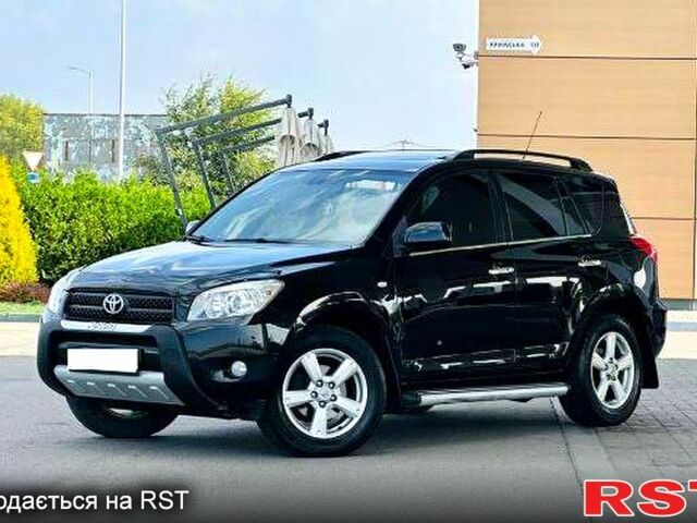 Черный Тойота РАВ 4, объемом двигателя 2 л и пробегом 200 тыс. км за 11000 $, фото 1 на Automoto.ua