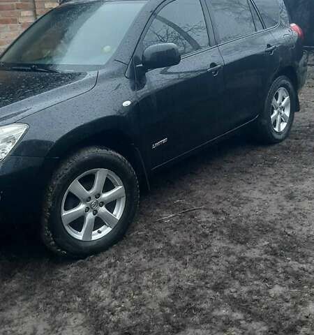 Черный Тойота РАВ 4, объемом двигателя 2.4 л и пробегом 317 тыс. км за 9500 $, фото 1 на Automoto.ua