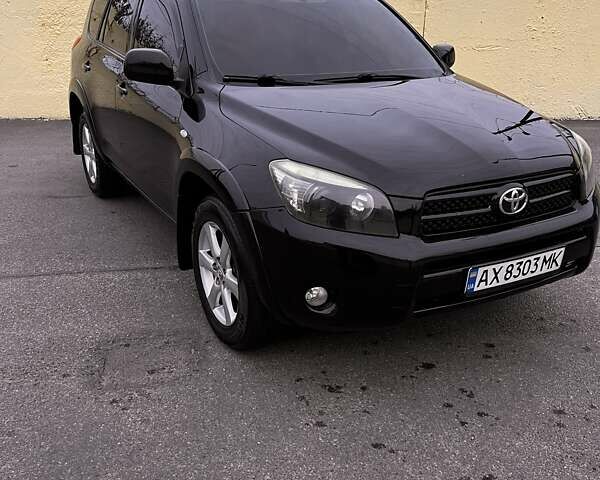 Черный Тойота РАВ 4, объемом двигателя 2.4 л и пробегом 268 тыс. км за 10500 $, фото 1 на Automoto.ua