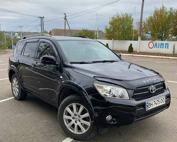 Черный Тойота РАВ 4, объемом двигателя 2.36 л и пробегом 196 тыс. км за 9500 $, фото 1 на Automoto.ua